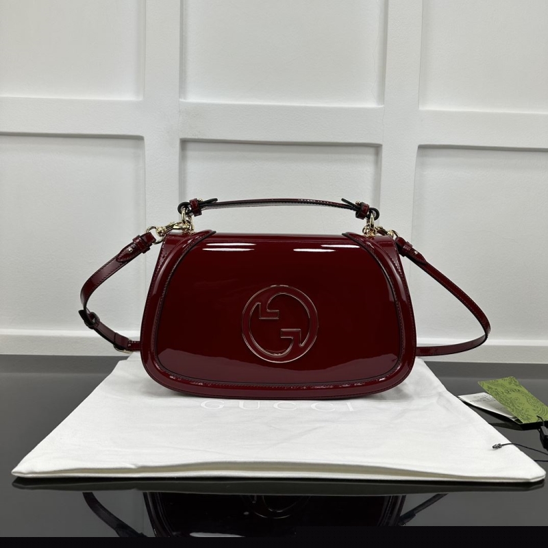 G*u*i top handle bags